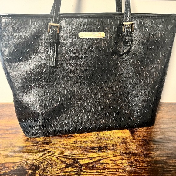 Michael Kors Handbags - Michael Kors Black Embossed MK Logo Tote with Gold Nameplate